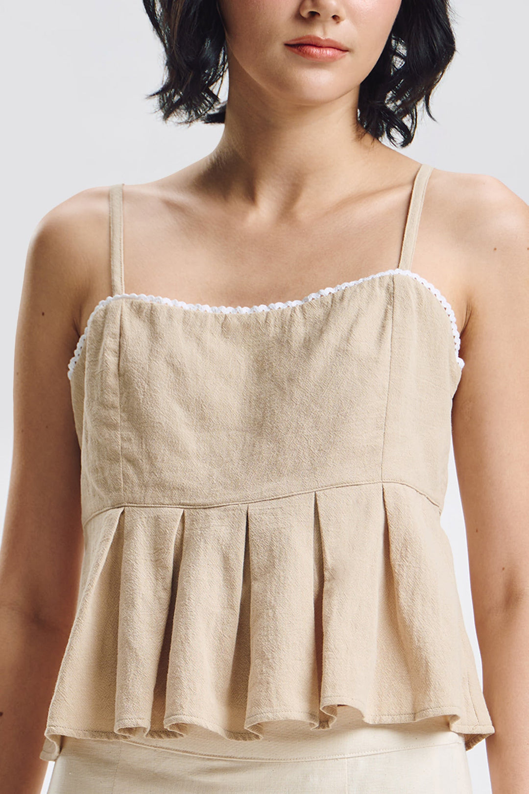 Sleeveless Peplum Top